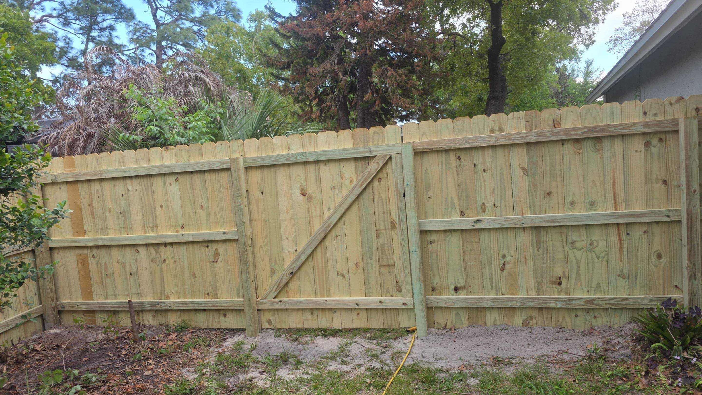 natural_pine wood dog_ear fence installation in WINTER SPRINGS, FL